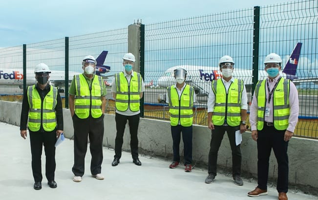 Shown (from left ) are: : Gen. Aaron N. Aquino (Ret.), President and CEO of Clark International Airport Corporation; Secretary Arthur P. Tugade, Department of Transportation;Garrick Thompson, FedEx Express Sales Senior Manager;Secretary Vince Dizon, Presidential Adviser on Flagship Programs and Projects; Jake Bingcang, Vice President of Bases Conversion Development Authority; and Ranny Chua, FedEx Express Operations Senior Manager.
