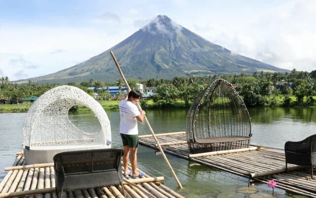 A tourist enjoys the view of Mayon Volcano from Sumlang Lake in Camalig, Albay. — PHILIPPINE STAR/ EDD GUMBAN
