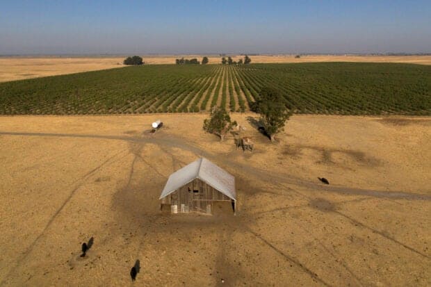 In this aerial photo is farmland in rural Solano County, Calif., Wednesday, Aug. 30, 2023. Silicon Valley billionaires and investors are behind a years-long, secretive land buying spree of more than 78 square miles (202 square kilometers) of farmland in Solano County with the goal of creating a new city. (AP Photo/Godofredo A. Vásquez