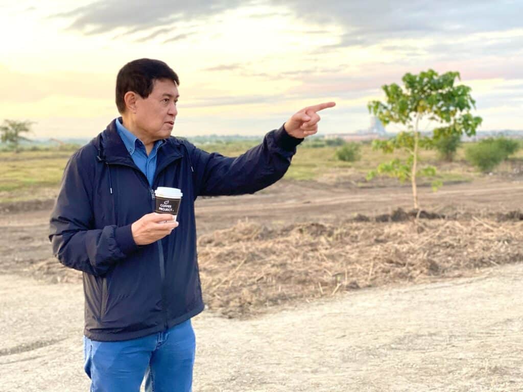 Vista Land Chairman Manuel B. Villar Jr. surveying his land bank
