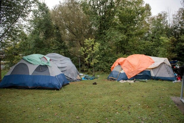 Tents are seen in a makeshift homeless encampment set up in a park in Granby, Quebec, Canada, on Sept 18, 2023. Canada, despite being a wealthy nation, is gripped by a surge in homelessness that has seen thousands of people living in the streets after being priced out of real estate and rental markets. (Photo by ANDREJ IVANOV / AFP)