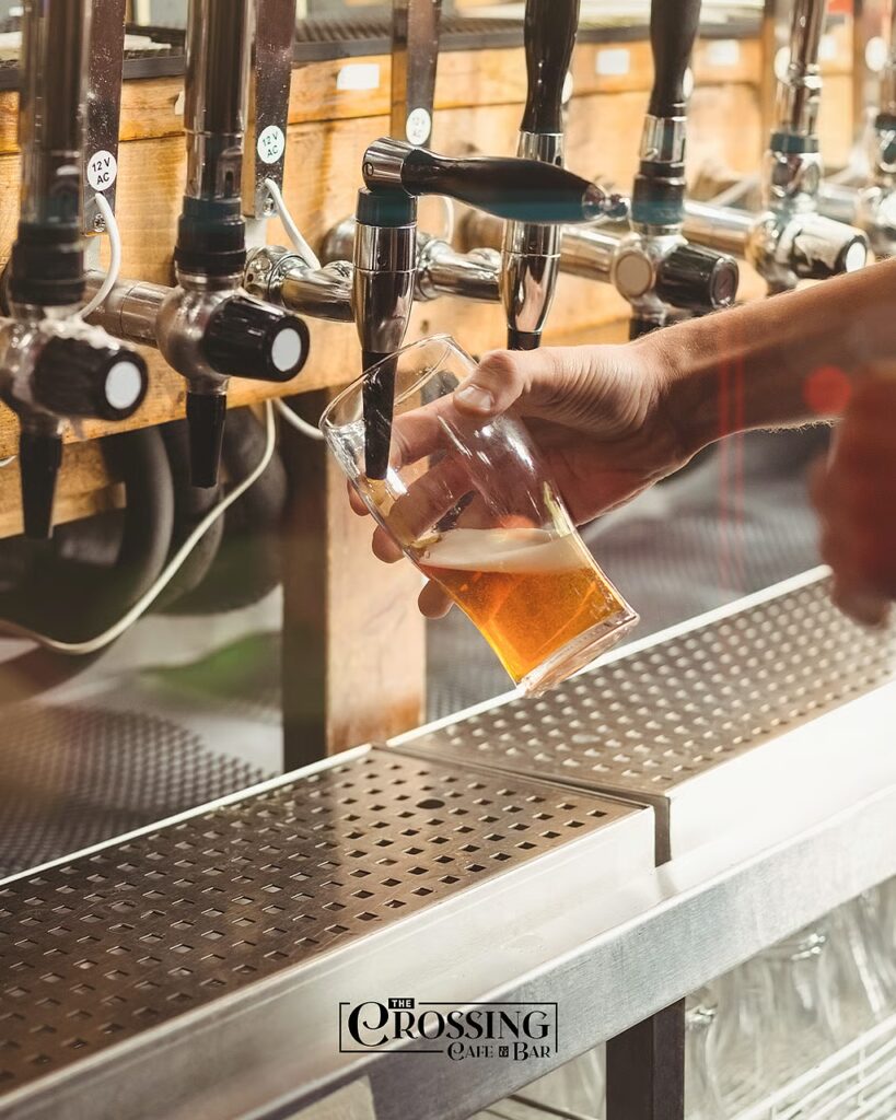 COLD beer matches the warm café glow.