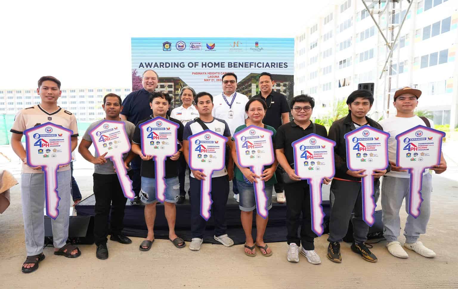 DHSUD, Pag-IBIG visit Laguna Project, hand keys to new condo owners under PBBM’s expanded 4PH